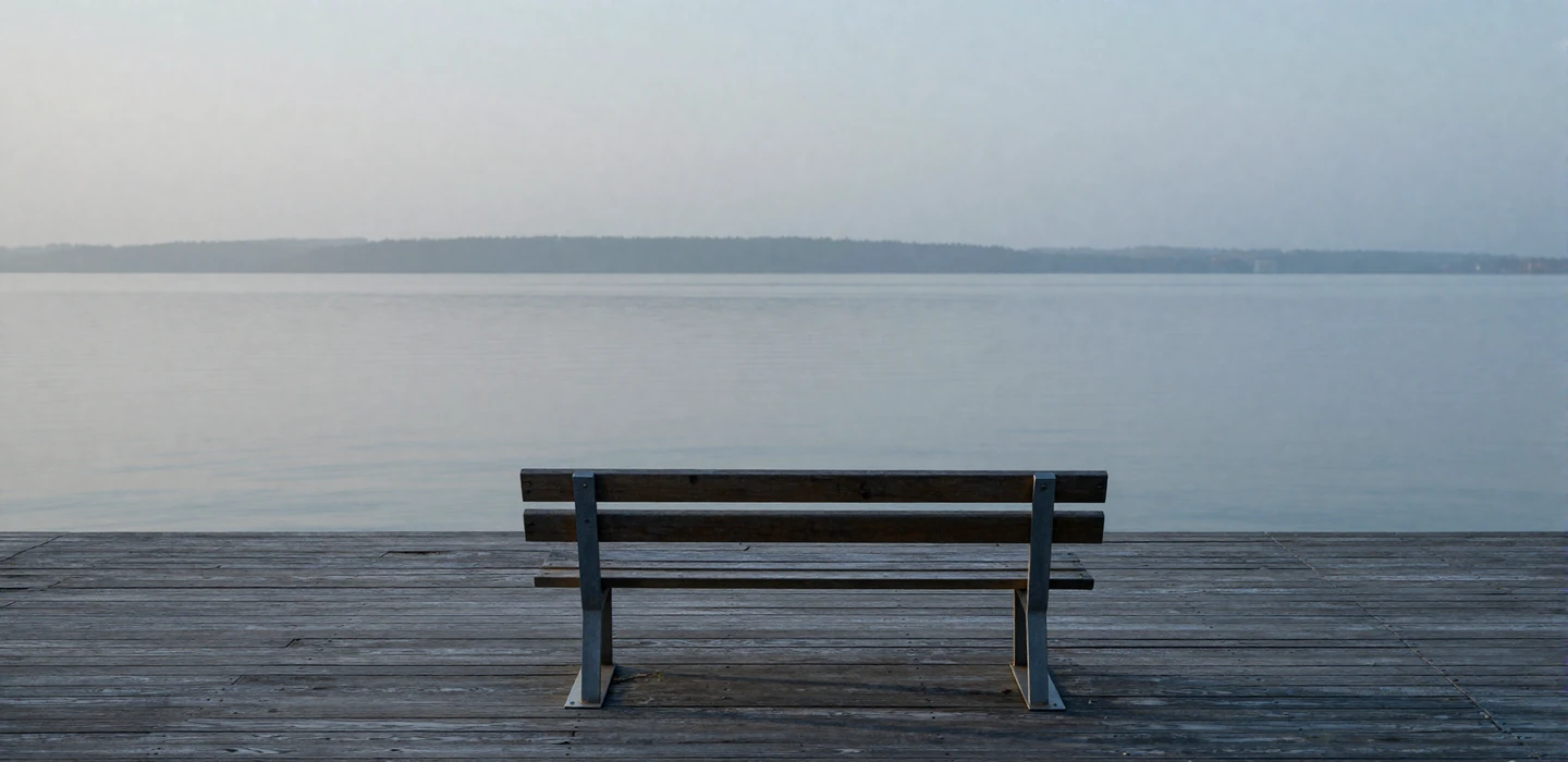 Quiet waterfront boardwalk at dawn representing the trust behind our military dating sites